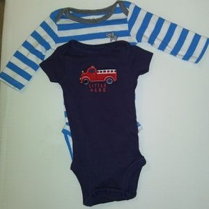 Two Carter's onesies